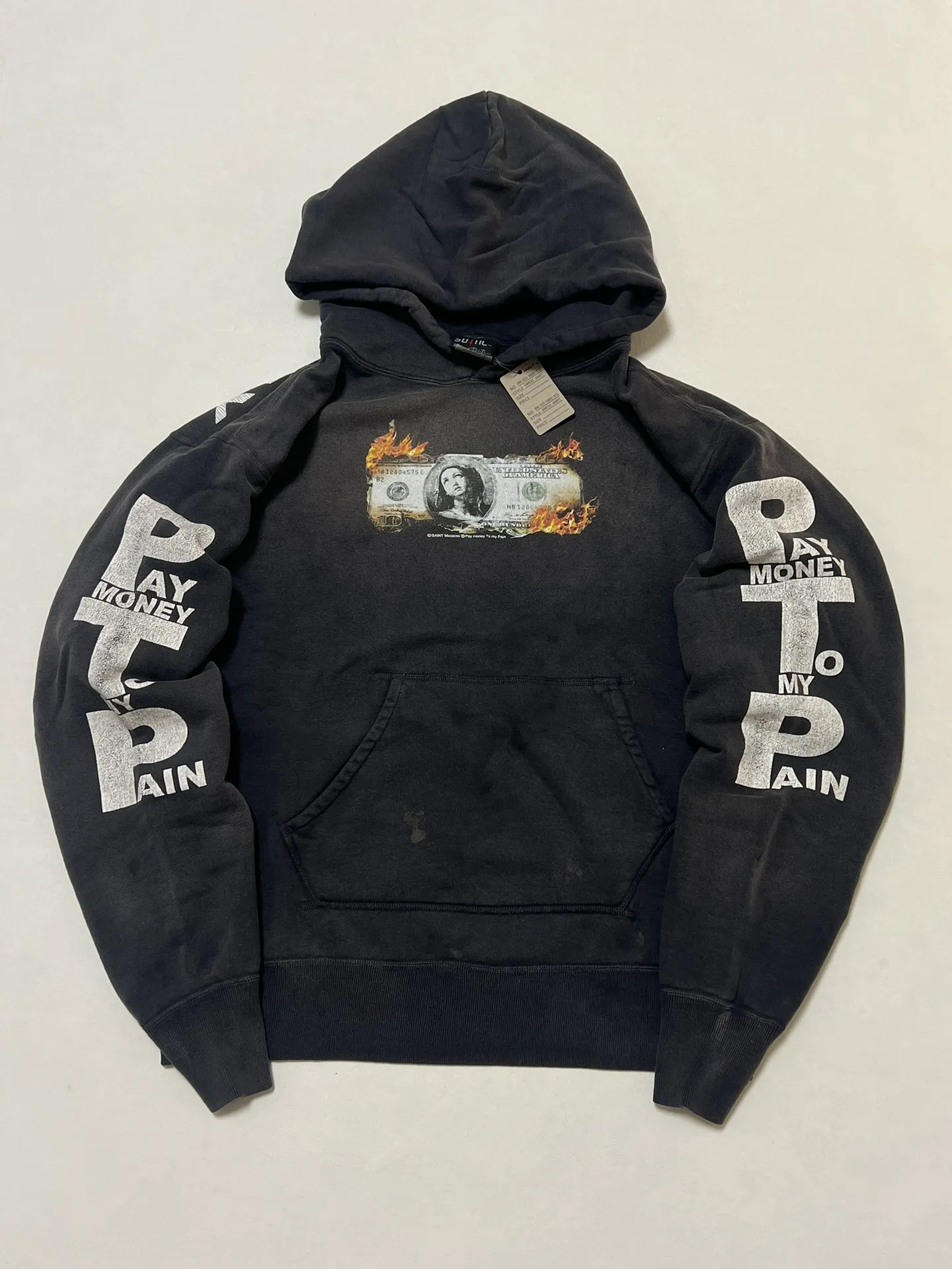 SAINT Mxxxxxx × PAY MONEY TO MY PAIN PTP_HOODIE/BRAND MONEY/BLK Co-branded PTP Virgin Mary dollar hoodie Washed black S-XL Assute dyeing The whole piece is sprayed with horse fade Mold customization joint main mark/washed mark Factory four-needle and six-thread workmanship No bone seams More comfortable to wear Repeated modification of proofing Authentic grade crack printing VINTAGE value is full
